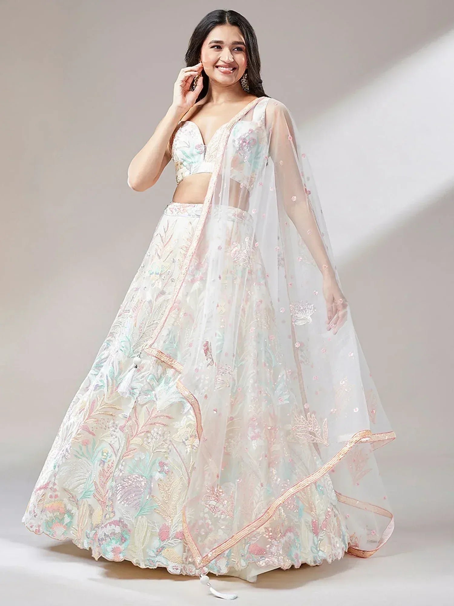 Astounding Off-White Sequins Soft Net Wedding Wear Lehenga Choli